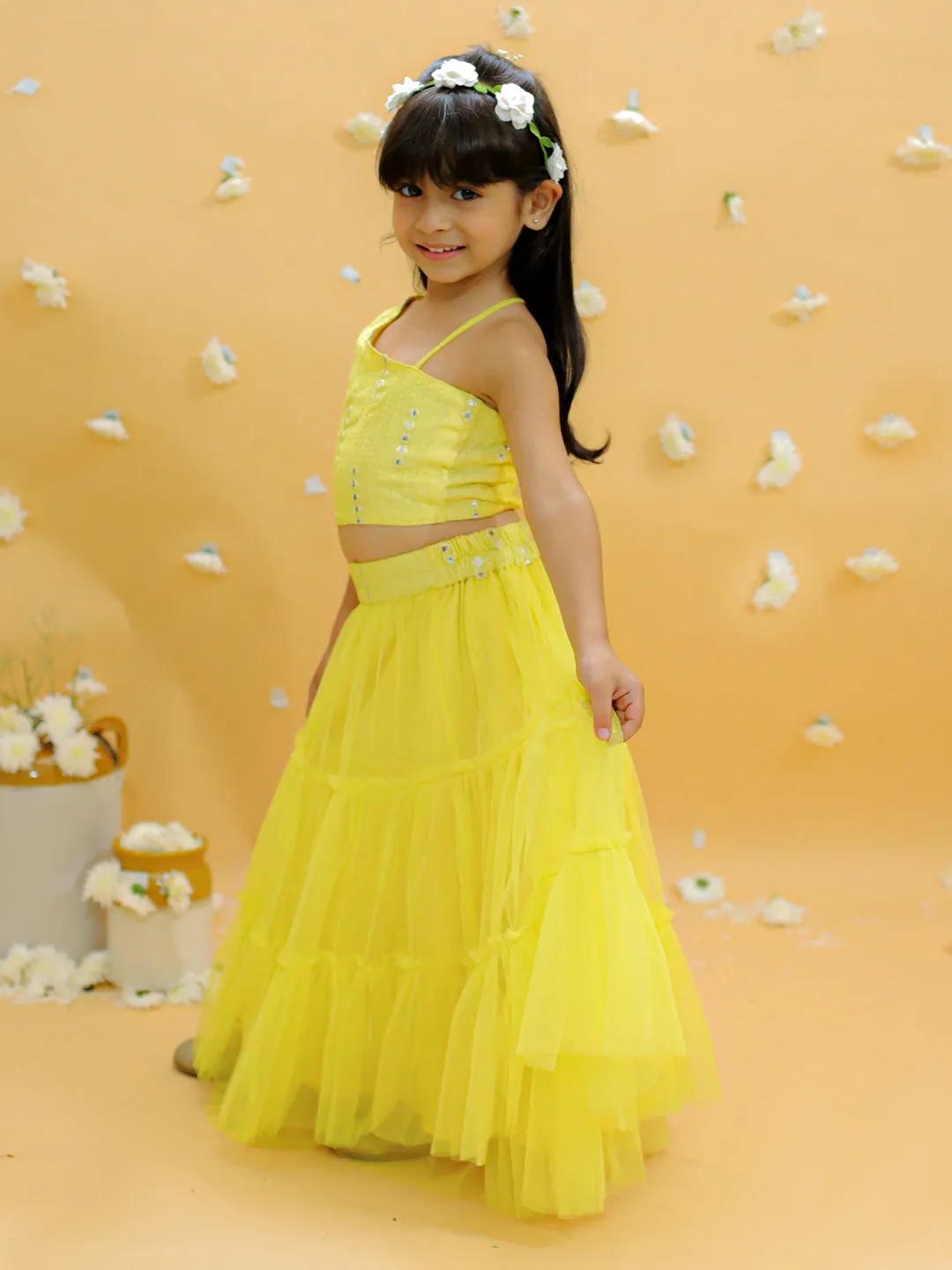 Girl's Off Shoulder Faux Mirror Choli With Tie Ups & Smocking At Back, Mesh Layered Flared Ghaghra With Faux Mirror Belt-Yellow - Lil Peacock