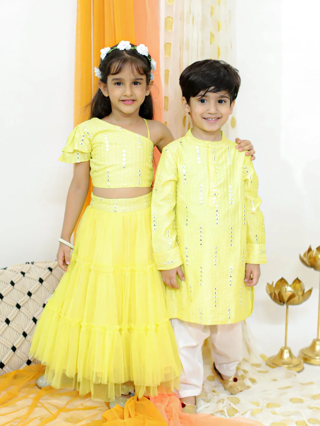 Girl's Off Shoulder Faux Mirror Choli With Tie Ups & Smocking At Back, Mesh Layered Flared Ghaghra With Faux Mirror Belt-Yellow - Lil Peacock